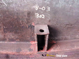 Fig. 4. Lateral shift of the drum and bolt failure on the shear plane.